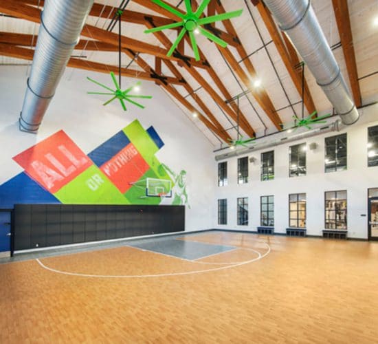 Indoor basketball court in apartment complex near PSU